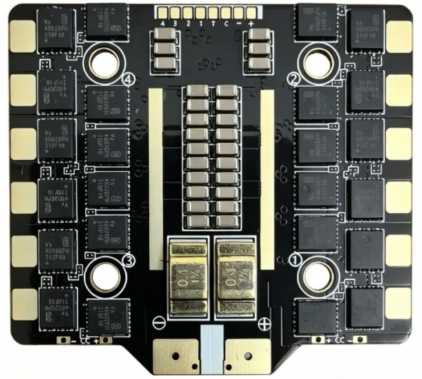 Component side of a dense 100A 4-in-1 ESC PCB showing controller, driver and power device sections